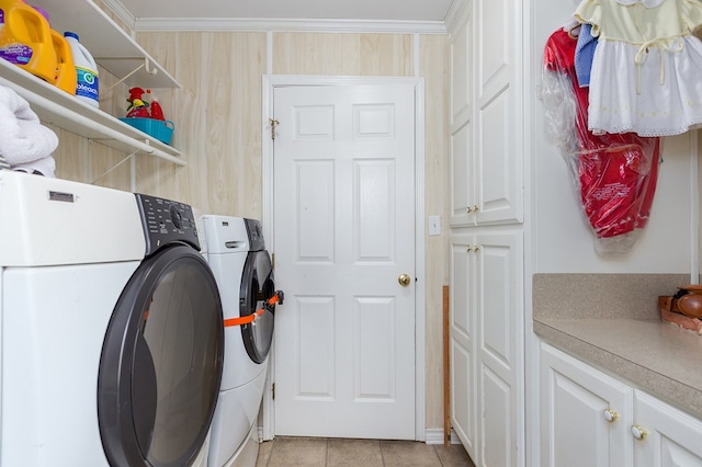 229 Thornton Rd, Huntington, TX 75949 - laundry room featuring independent washer and dryer, light tile patterned flooring, cabinet space, and crown molding
