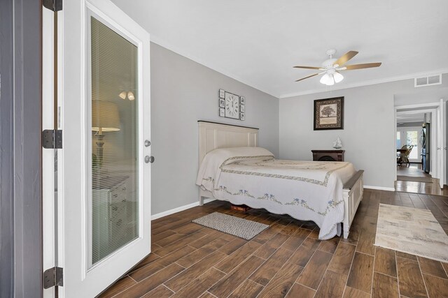 bedroom with dark hardwood / wood-style floors, ceiling fan, and ornamental molding