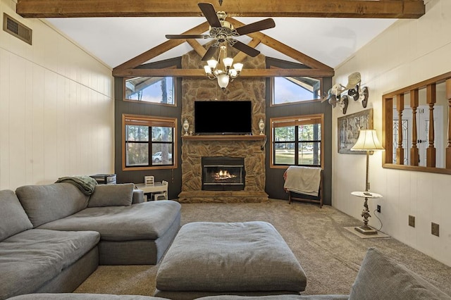 carpeted living room with beamed ceiling, high vaulted ceiling, a fireplace, and ceiling fan