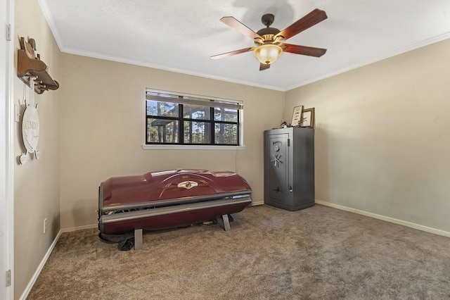 bedroom with carpet, ceiling fan, and ornamental molding