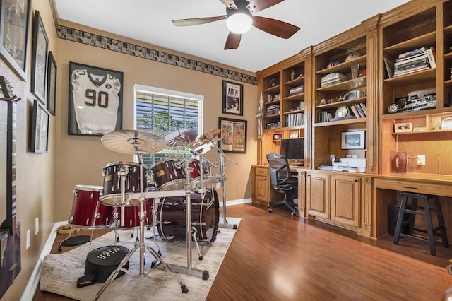 office featuring wood-type flooring and ceiling fan