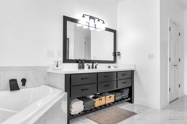 bathroom with vanity, ornamental molding, and a washtub