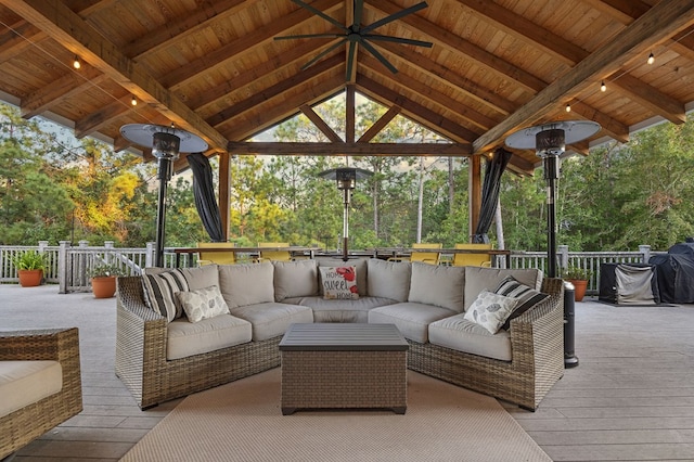 view of patio / terrace with a gazebo, an outdoor hangout area, and a deck