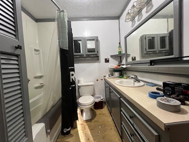 full bathroom with backsplash, hardwood / wood-style floors, shower / bath combination with curtain, a textured ceiling, and toilet