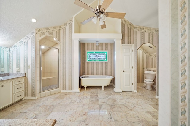 full bathroom with a textured ceiling, vanity, separate shower and tub, ceiling fan, and toilet