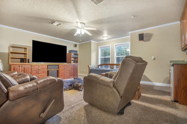 living room with ceiling fan, light colored carpet, ornamental molding, and a textured ceiling