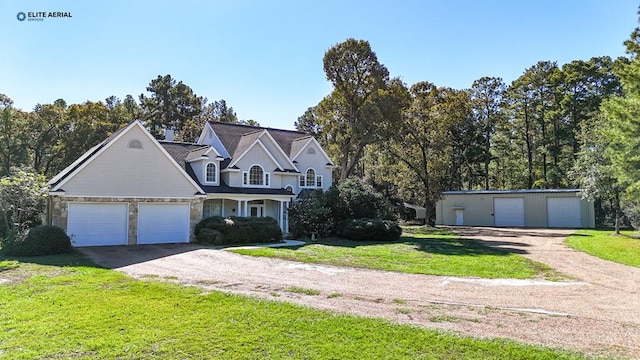 view of front facade with a garage and a front yard