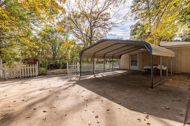 view of parking / parking lot with a carport