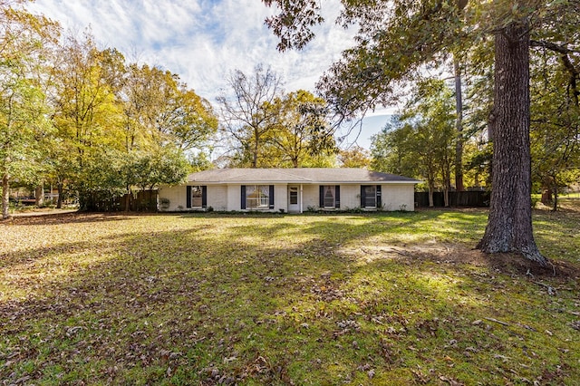 view of front of home with a front lawn