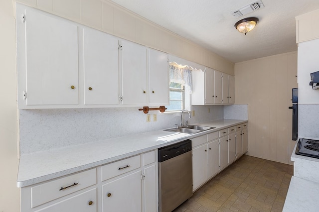 kitchen featuring sink, dishwasher, white cabinetry, tasteful backsplash, and a textured ceiling