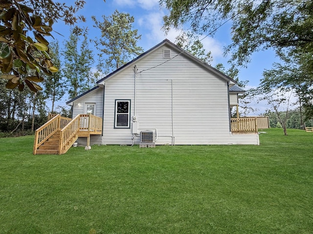 4124 N US Highway 96, Jasper, TX 75951 - rear view of house featuring a lawn