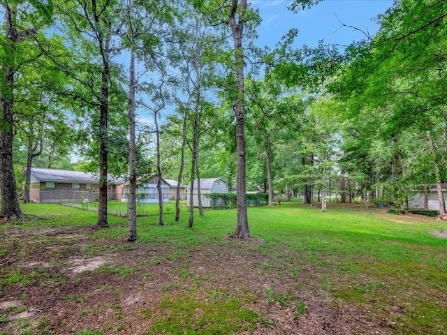 view of yard with fence