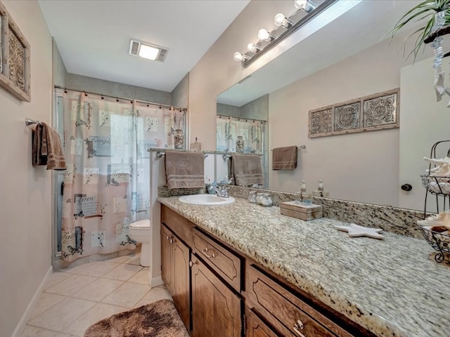 full bathroom featuring vanity, a shower with curtain, visible vents, tile patterned floors, and toilet