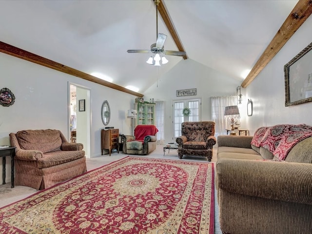 living area featuring beam ceiling, a ceiling fan, carpet floors, and high vaulted ceiling