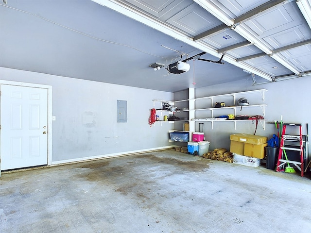 garage featuring electric panel and a garage door opener