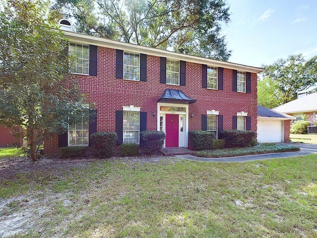 colonial inspired home featuring cooling unit