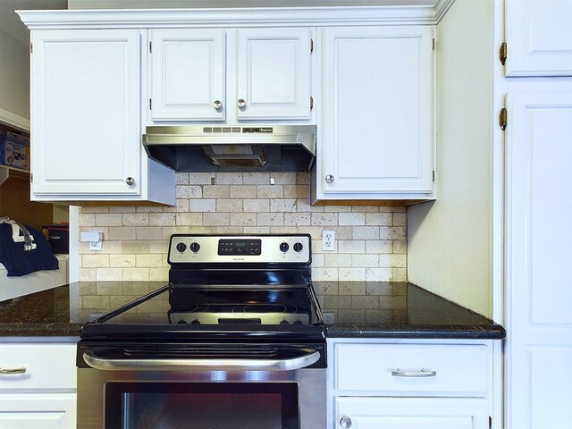 kitchen with stainless steel electric range, white cabinetry, exhaust hood, and tasteful backsplash