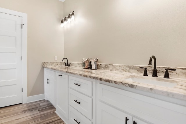 1911 Paul Ave, Lufkin, TX 75901 - full bath with double vanity and wood finished floors