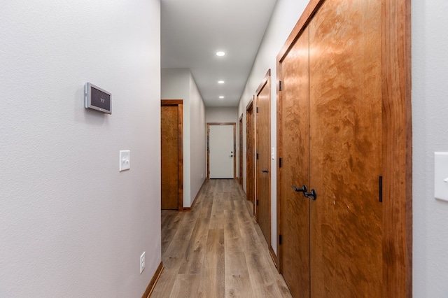 1308 Walnut Bend Dr, Lufkin, TX 75904 - hall with light wood-style flooring, recessed lighting, and baseboards