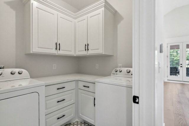 175 Vantage Dr, Brookeland, TX 75931 - laundry area with cabinet space, separate washer and dryer, and light wood-style floors