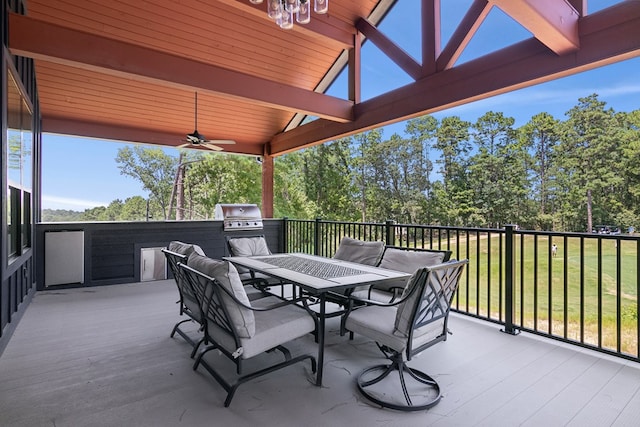175 Vantage Dr, Brookeland, TX 75931 - view of patio / terrace featuring outdoor dining space, ceiling fan, an outdoor kitchen, area for grilling, and a wooden deck