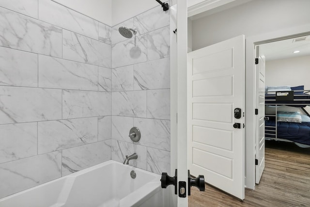 175 Vantage Dr, Brookeland, TX 75931 - full bath featuring shower / washtub combination and wood finished floors