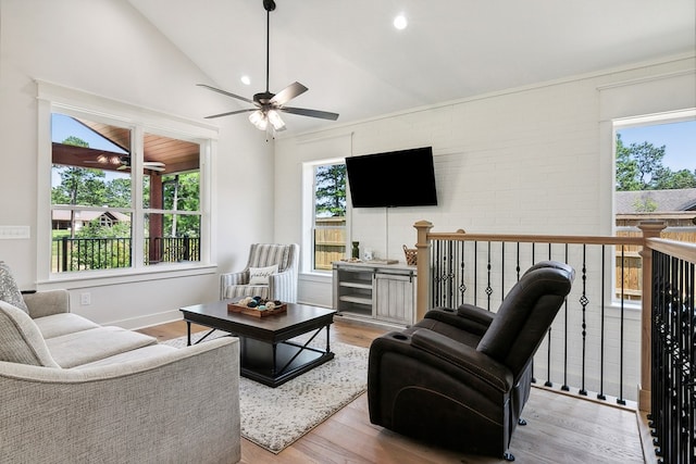 175 Vantage Dr, Brookeland, TX 75931 - living room featuring ceiling fan, wood finished floors, and vaulted ceiling
