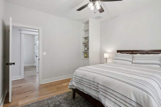 175 Vantage Dr, Brookeland, TX 75931 - bedroom featuring light wood-style flooring, baseboards, and a ceiling fan
