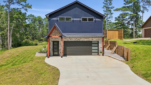 175 Vantage Dr, Brookeland, TX 75931 - contemporary home featuring stone siding, an attached garage, concrete driveway, and a front yard