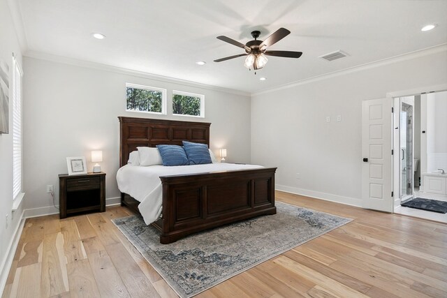 175 Vantage Dr, Brookeland, TX 75931 - bedroom with light wood-type flooring, crown molding, baseboards, ensuite bath, and a ceiling fan