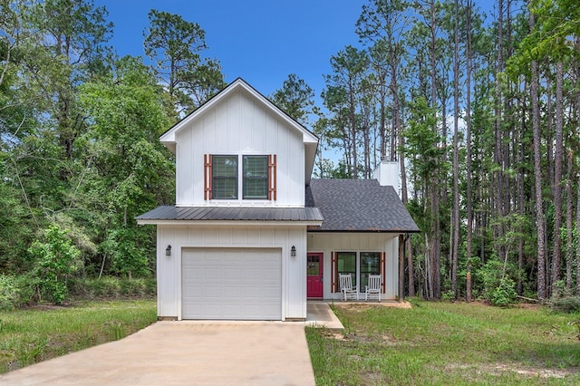 140 Spruce Ln, Brookeland, TX 75931 - modern farmhouse style home featuring board and batten siding, driveway, an attached garage, and covered porch