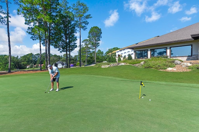 140 Spruce Ln, Brookeland, TX 75931 - view of community with a putting green