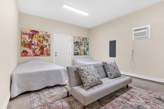 140 Spruce Ln, Brookeland, TX 75931 - bedroom featuring a wall mounted air conditioner, electric panel, and concrete flooring