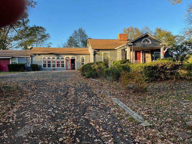 905 Fm 353, San Augustine, TX 75972 - view of front of home featuring a chimney