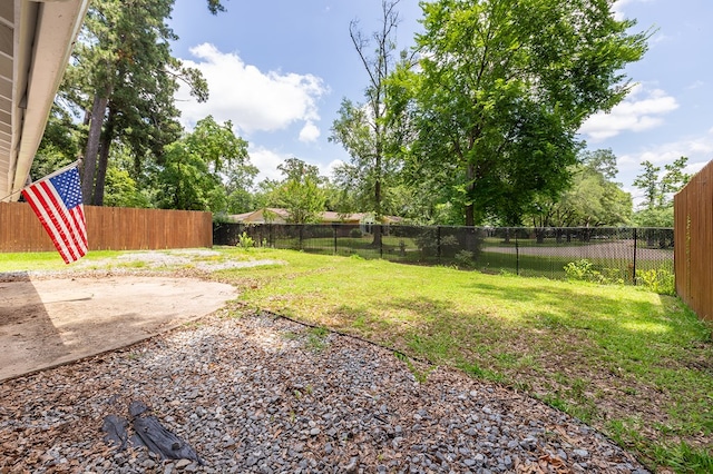 1405 Cimmarron St, Lufkin, TX 75904 - view of yard featuring a patio area