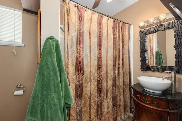 1405 Cimmarron St, Lufkin, TX 75904 - bathroom with vanity, ceiling fan, and a shower with curtain