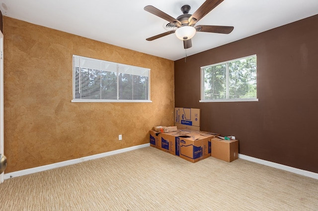 1405 Cimmarron St, Lufkin, TX 75904 - spare room with ceiling fan, carpet, and baseboards