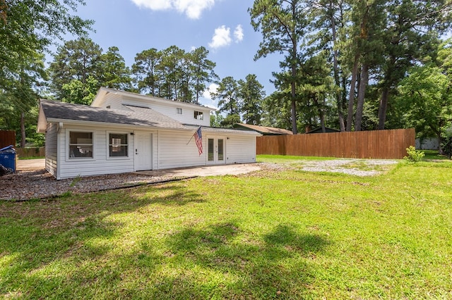 1405 Cimmarron St, Lufkin, TX 75904 - rear view of house featuring french doors and a patio
