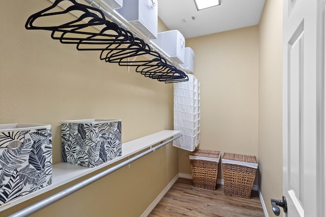 185 Ashley Dr, Brookeland, TX 75931 - spacious closet with wood finished floors