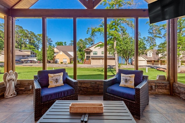185 Ashley Dr, Brookeland, TX 75931 - sunroom featuring lofted ceiling, a residential view, and an outdoor living space