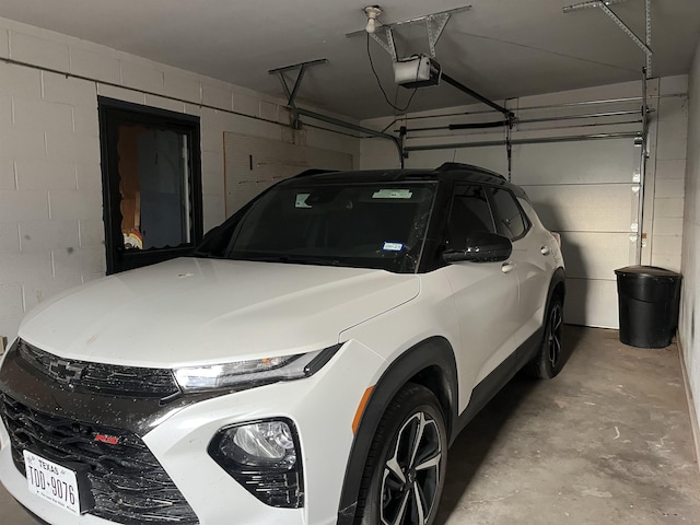 garage featuring a garage door opener