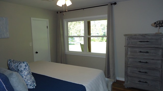 bedroom featuring dark wood-type flooring