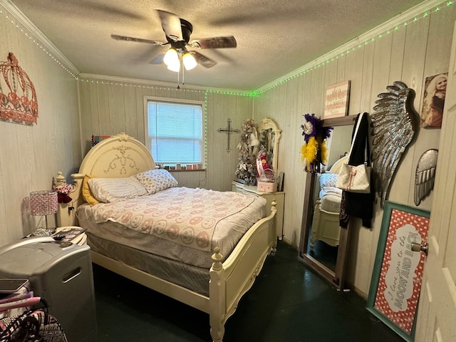 bedroom featuring a textured ceiling, ceiling fan, and crown molding