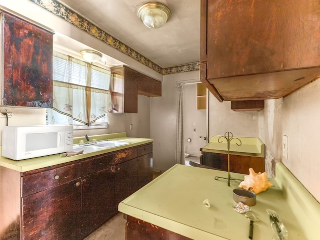 3314 Brook Holw, Nacogdoches, TX 75964 - kitchen with white microwave and a sink