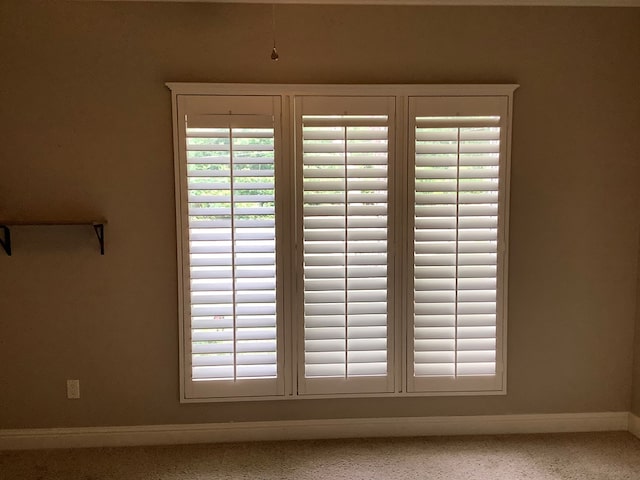 810 Denton Dr, Jasper, TX 75951 - detailed view of baseboards and carpet floors
