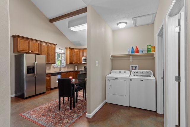 182 Post Oak Ln, Brookeland, TX 75931 - laundry room featuring independent washer and dryer and baseboards