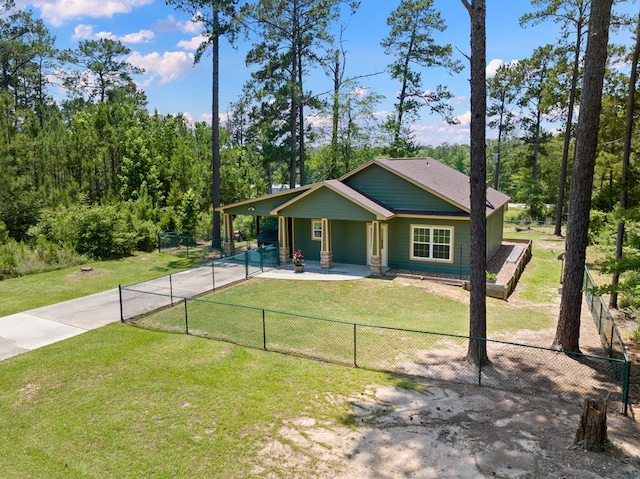 182 Post Oak Ln, Brookeland, TX 75931 - view of front of house with concrete driveway and a carport