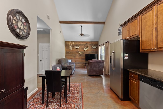 182 Post Oak Ln, Brookeland, TX 75931 - kitchen featuring appliances with stainless steel finishes, high vaulted ceiling, finished concrete flooring, beamed ceiling, and open floor plan