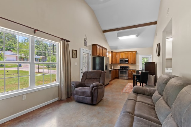 182 Post Oak Ln, Brookeland, TX 75931 - living room with finished concrete flooring, high vaulted ceiling, and baseboards