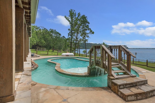 388 County Road 5597, Etoile, TX 75944 - view of swimming pool featuring a water view and a pool with connected hot tub